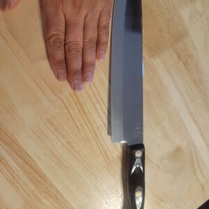 Sleek Black Handle Chef's  Cutco Knife